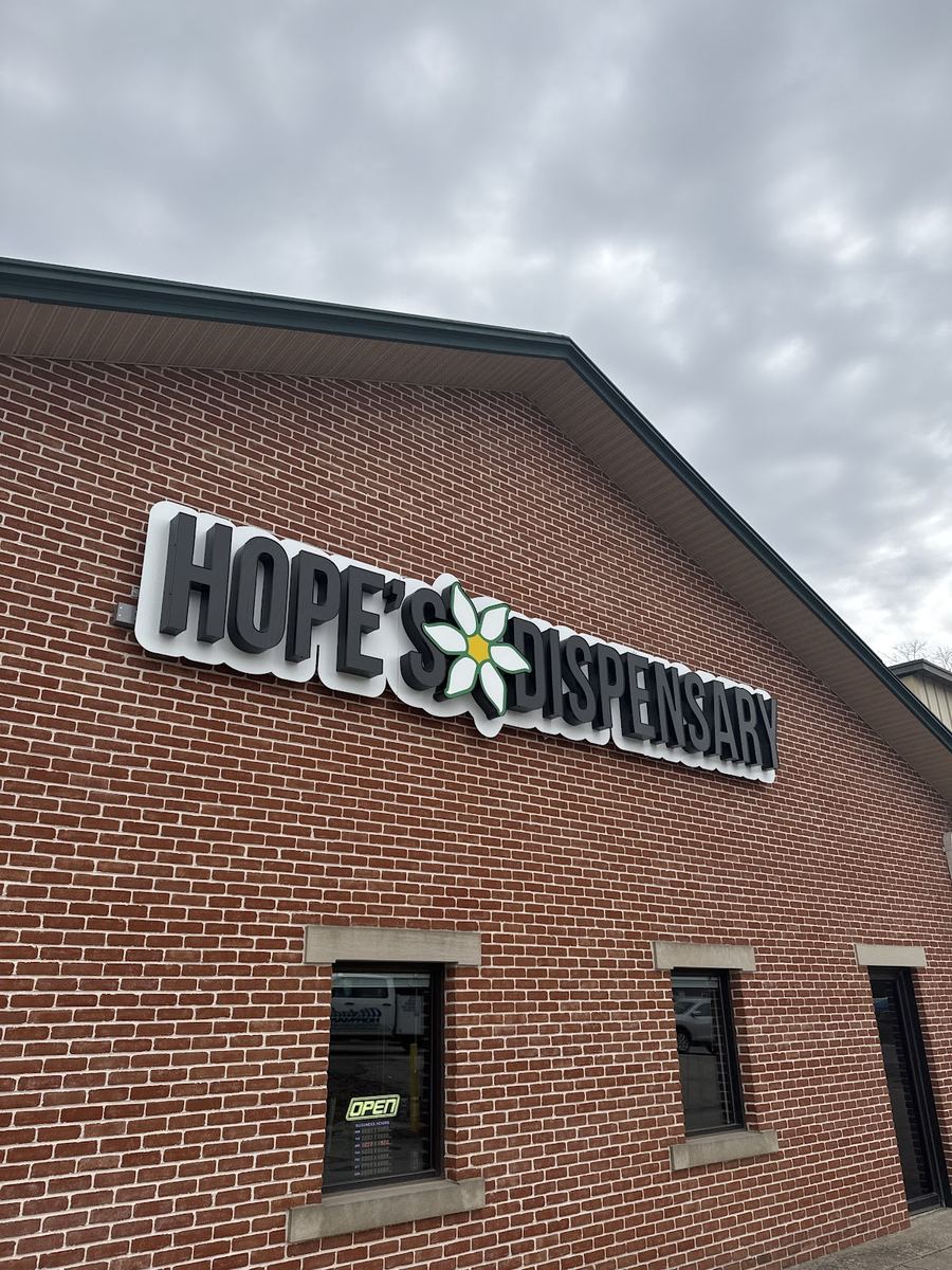 Commercial storefront sign install by Top Phase Electric